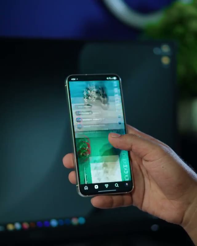 Hand scrolling a vertical 9:16 short-form video feed on a smartphone