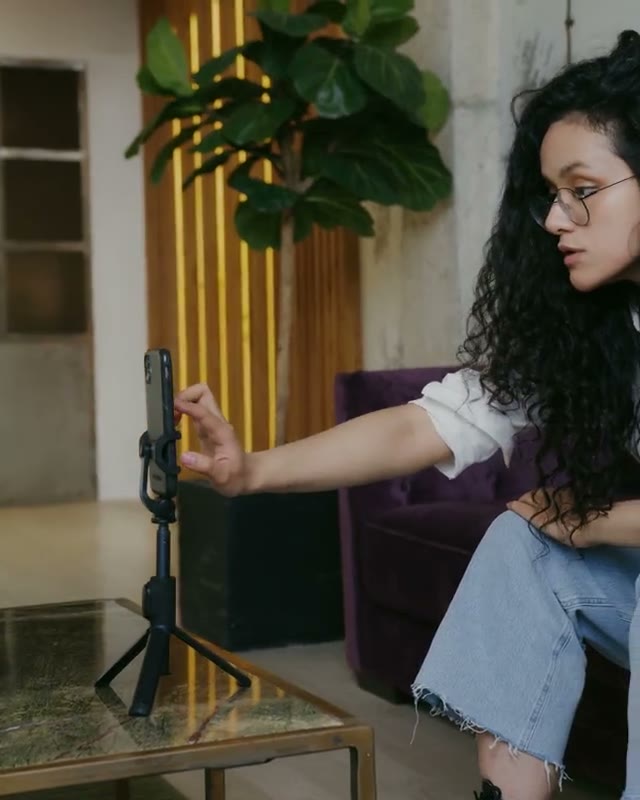 Creator filming a vertical short-form video on a phone
